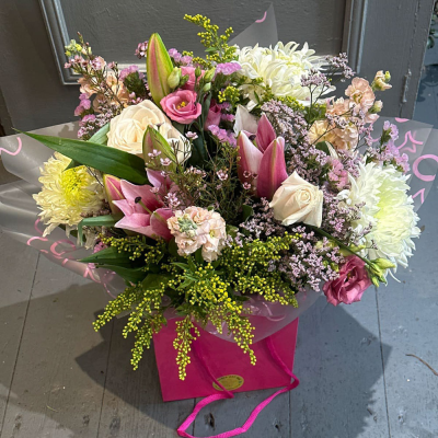 Mamma Mia - Make their day with this bright and vibrant collection of flowers, beautifully presented in a gift box / bag. Send your love with an exquisite delivery delivered same day when you order before 2pm.
