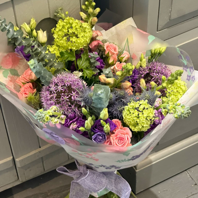 Cool Breeze - This classical stylish collection of flowers make this hand tied the perfect gift. Professionally arranged and delivered by a local florist. Flowers available for same day delivery when ordered before 2pm.