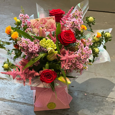 Mrs Kisses - Send lots of love and kisses with this classic hand-tied bouquet featuring a selection of romantic flowers finished with a luxurious single red rose.