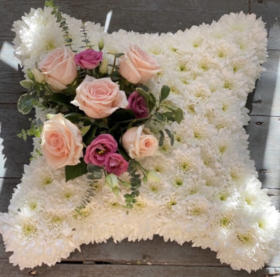 Cute cushion - White based custion with a fresh rose spray
