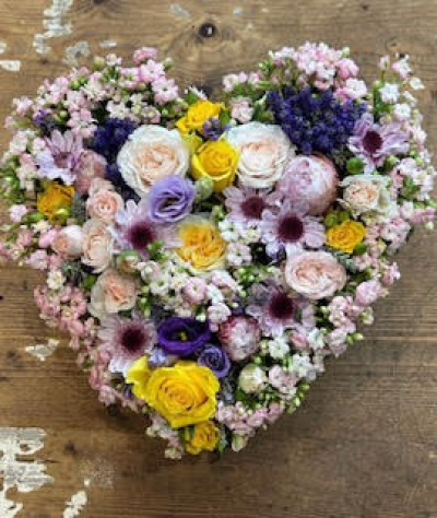 Sweet dreams - Heart shaped tribute of beautiful mixed flowers